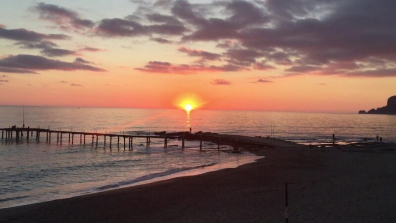 amazing beautiful sunset beach scene at alanya, antalya, turkey