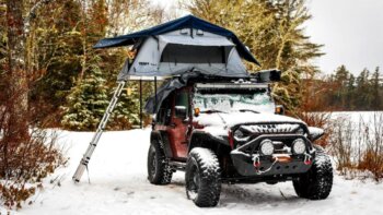 explore the thrill of winter camping in a cozy, heated tent.